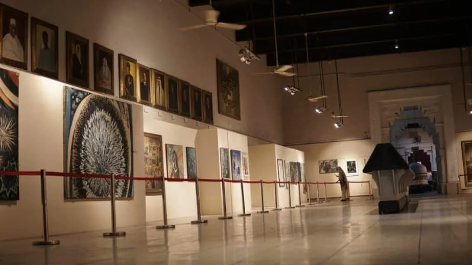Visitors viewing artwork in a gallery